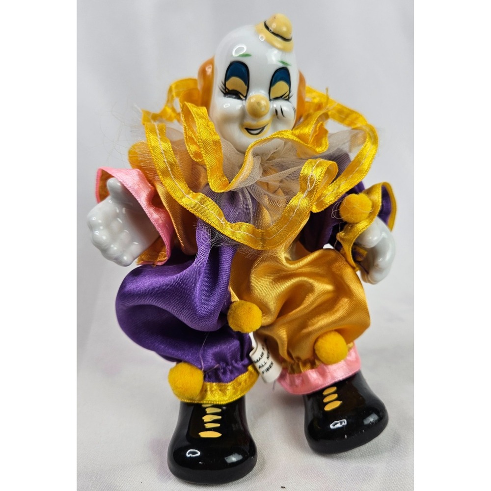 VTG Primark Intl. Porcelain Clown Jester Doll Purple Gold Satin Ruffle Collector